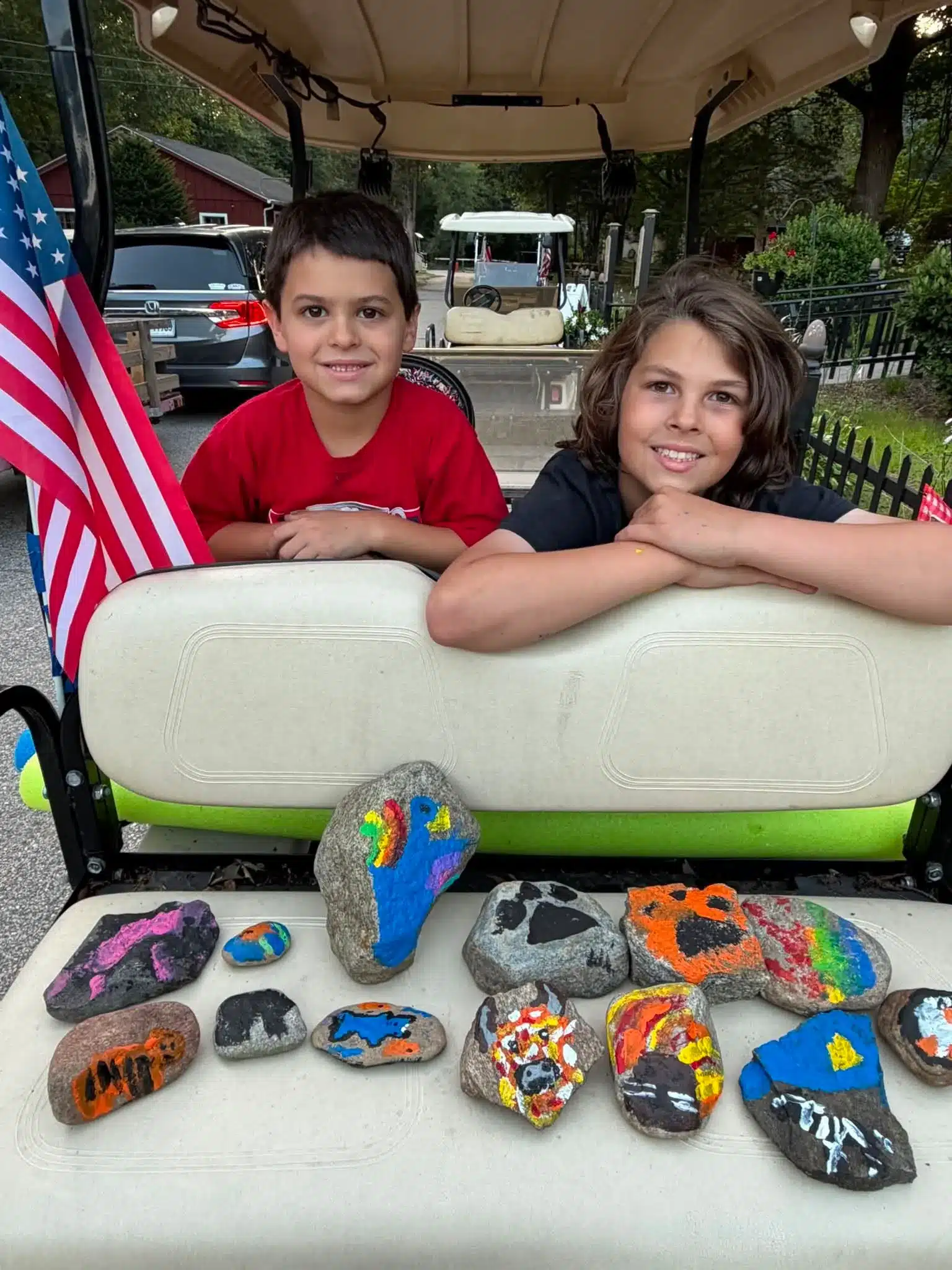 Young campers posing near an American flag in Bozrah CT