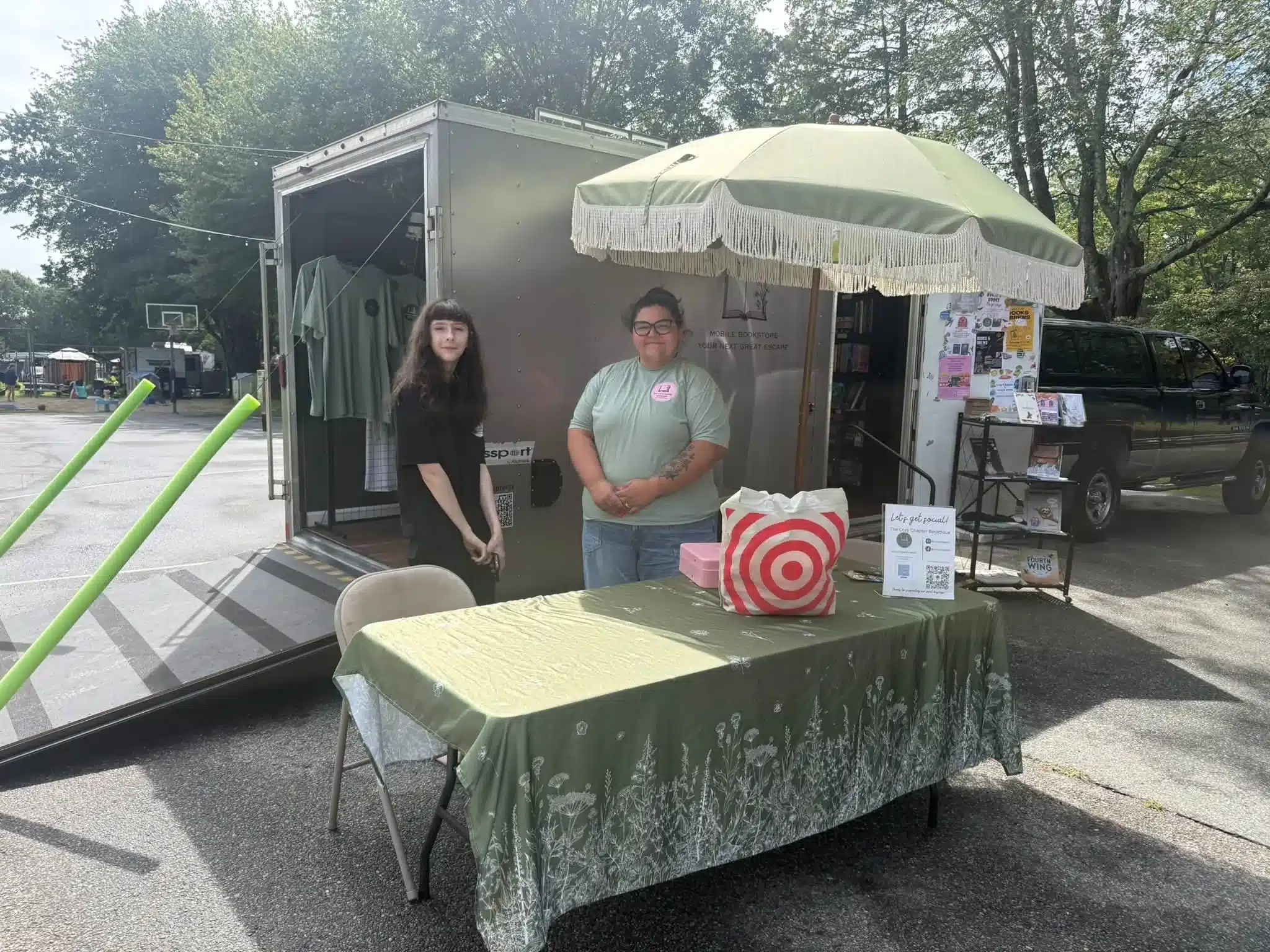 Campground vendor stand beside an RV at Acorn Acres